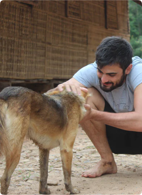 there is a men with his dog